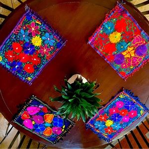 Set of 4 Guatemalan hand embroidered table mats.